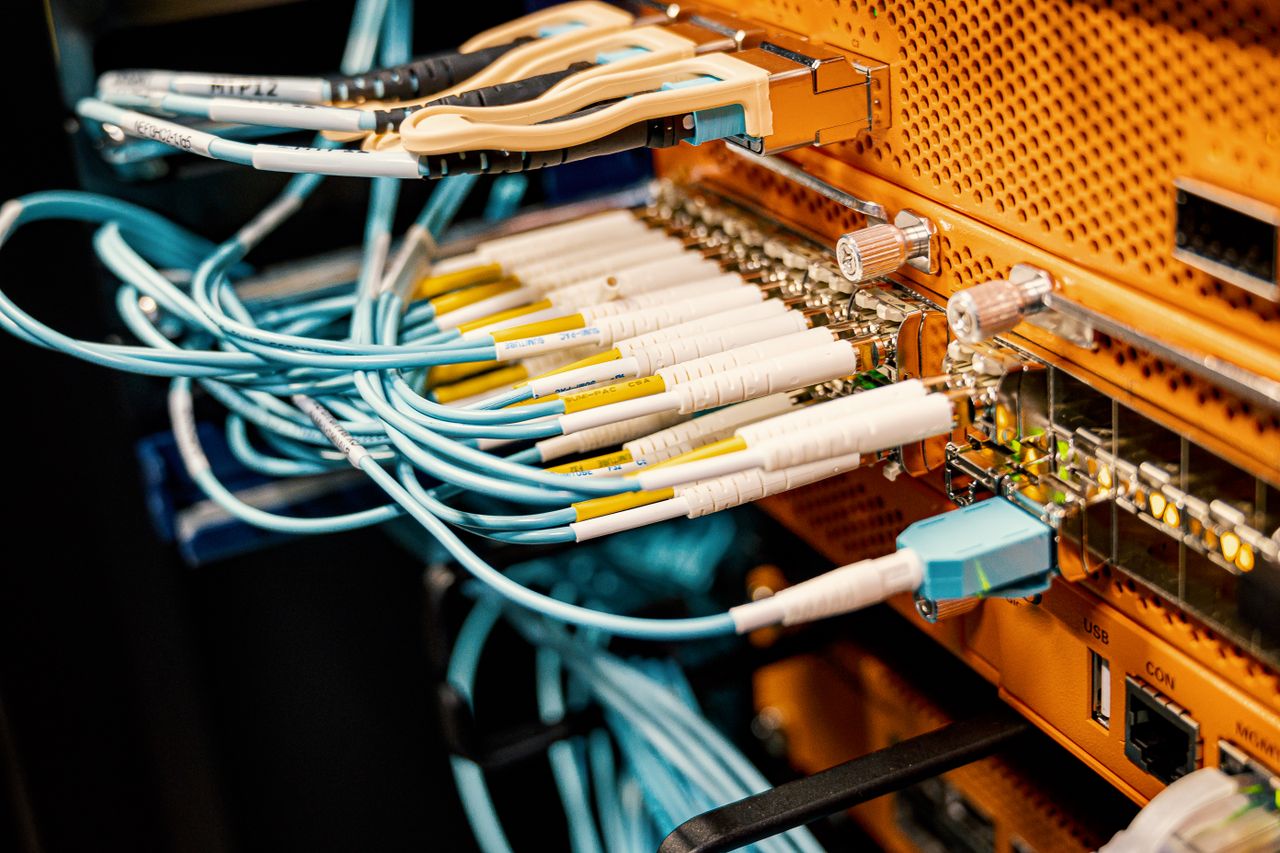 The Art of Drawing Readers In: Your attractive post title goes here Modern hardware and structured cabling system with patch cords inserted into patch panel outlets